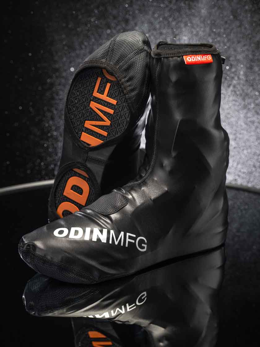 Odin Mfg waterproof motorcycle boot covers fitted over riding footwear in wet conditions